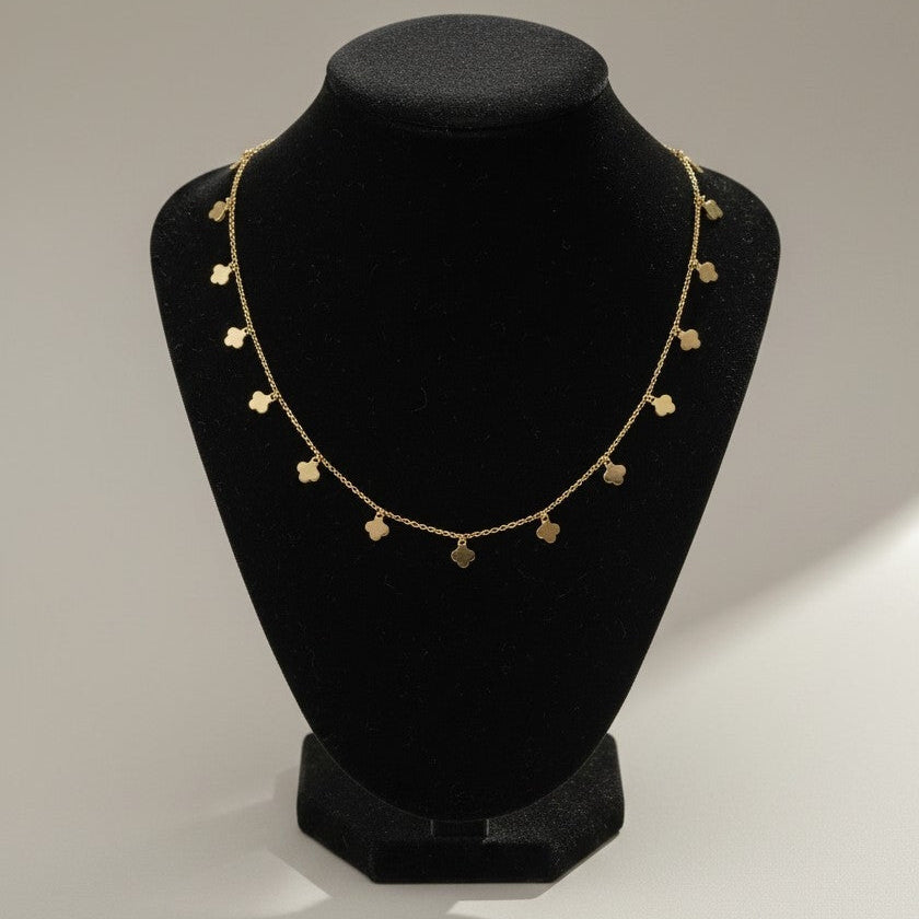 Collar dorado tréboles