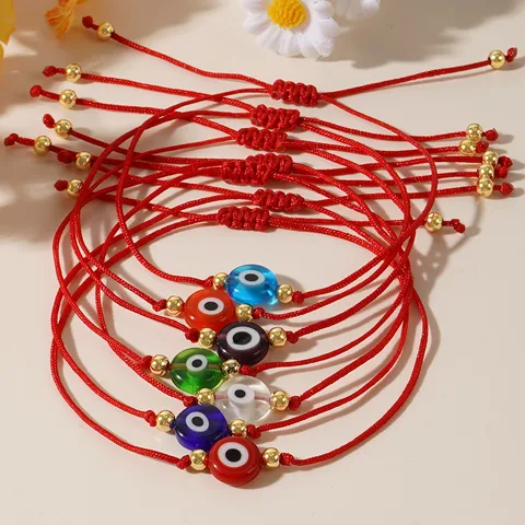 Juego de pulsera roja con ojitos varios colores