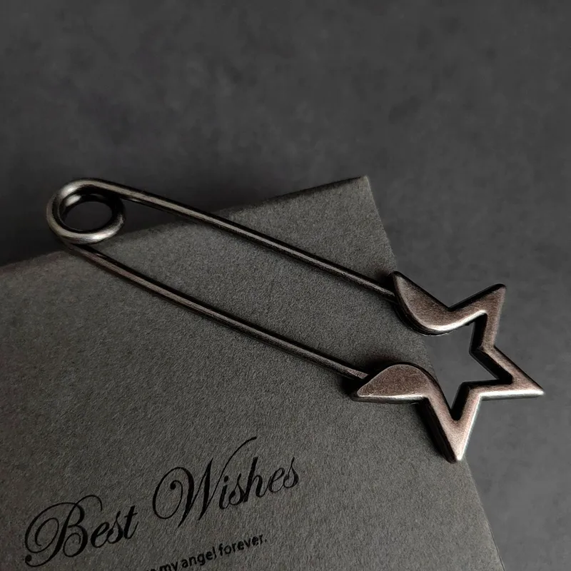 Broche asimétrico acero inoxidable estrella