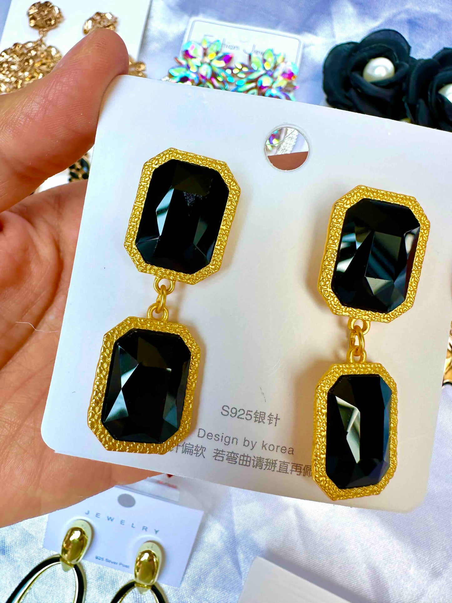 Aretes de fiesta dorado y negro rectángular