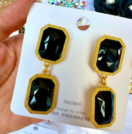 Aretes de fiesta dorado y negro rectángular