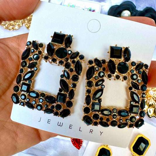Aretes de fiesta dorado y negro cuadrado