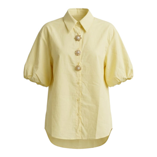 Camisa manga corta botones latón