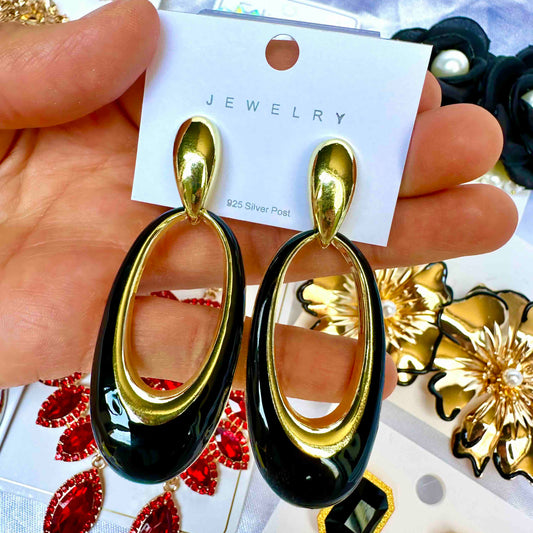 Aretes de fiesta dorado y negra ovalado