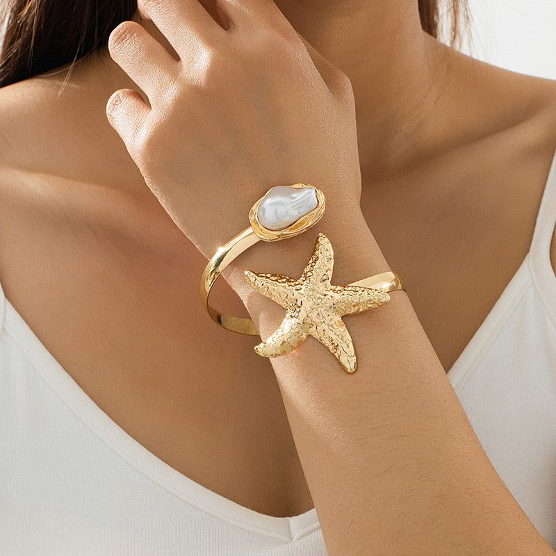 Brazalete dorado estrella de mar perla aleación abierto